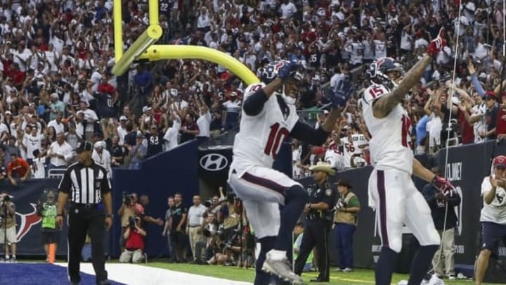 Sep 11, 2016; Houston, TX, USA; Houston Texans wide receiver Will Fuller (15) celebrates with wide receiver DeAndre Hopkins (10) after scoring a touchdown during the fourth quarter against the Chicago Bears at NRG Stadium. The Texans won 23-14. Mandatory Credit: Troy Taormina-USA TODAY Sports