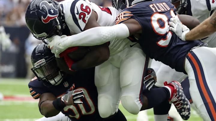 Sep 11, 2016; Houston, TX, USA; Houston Texans running back Lamar Miller (26) runs as Chicago Bears outside linebacker Leonard Floyd (94) defends during the first half at NRG Stadium. Mandatory Credit: Kevin Jairaj-USA TODAY Sports