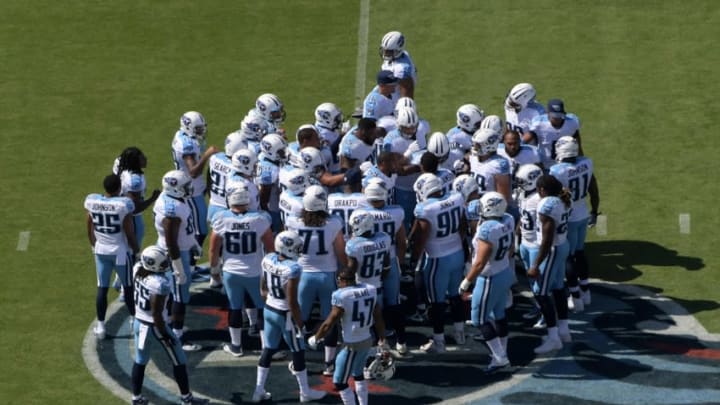 Sep 25, 2016; Nashville, TN, USA; Tennessee Titans players huddle at midfield against the Oakland Raiders at Nissan Stadium. Mandatory Credit: Kirby Lee-USA TODAY Sports