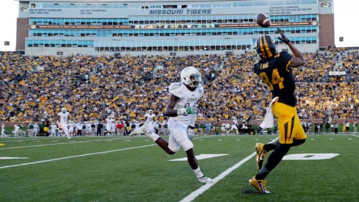 COLUMBIA, MO - SEPTEMBER 10: Wide receiver Emanuel Hall #84 of the Missouri Tigers catches a pass and beats defensive back Ross Williams #14 of the Eastern Michigan Eagles in for a touchdown during the first half of the game against the Eastern Michigan Eagles at Faurot Field/Memorial Stadium on September 10, 2016 in Columbia, Missouri. (Photo by Jamie Squire/Getty Images)