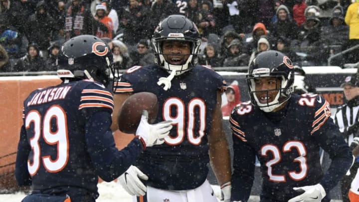 CHICAGO, IL - DECEMBER 24: Jonathan Bullard #90 and Kyle Fuller #23 of the Chicago Bears celebrate after Fuller intercepted the football in the second quarter against the Cleveland Browns at Soldier Field on December 24, 2017 in Chicago, Illinois. (Photo by David Banks/Getty Images)