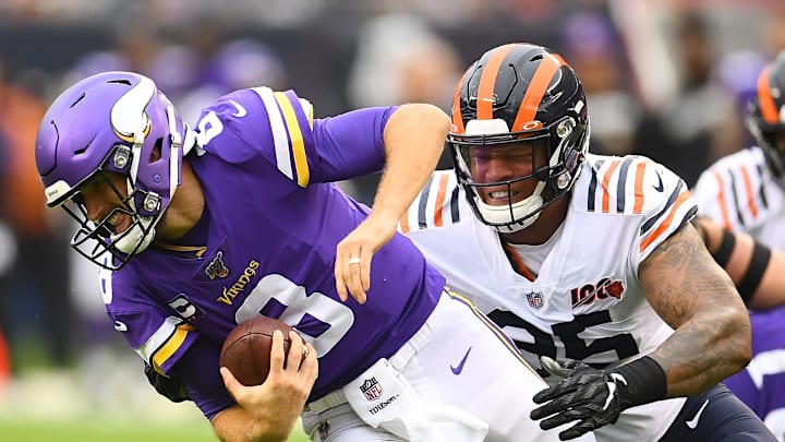 CHICAGO, ILLINOIS – SEPTEMBER 29: Roy Robertson-Harris #95 of the Chicago Bears sacks Kirk Cousins #8 of the Minnesota Vikings during the first half at Soldier Field on September 29, 2019 in Chicago, Illinois. (Photo by Stacy Revere/Getty Images)