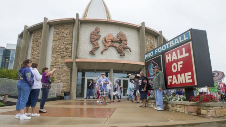 CANTON, OH - AUGUST 2: Fans take a photo outside the Hall of Fame prior to the NFL Class of 2014 Pro Football Hall of Fame Enshrinement Ceremony at Fawcett Stadium on August 2, 2014 in Canton, Ohio. (Photo by Jason Miller/Getty Images)