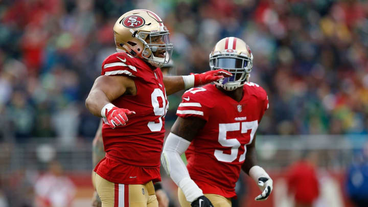 SANTA CLARA, CA – NOVEMBER 26: Solomon Thomas #94 and Eli Harold #57 of the San Francisco 49ers celebrate after the Seattle Seahawks missed a field goal attempt at Levi’s Stadium on November 26, 2017 in Santa Clara, California. (Photo by Lachlan Cunningham/Getty Images)