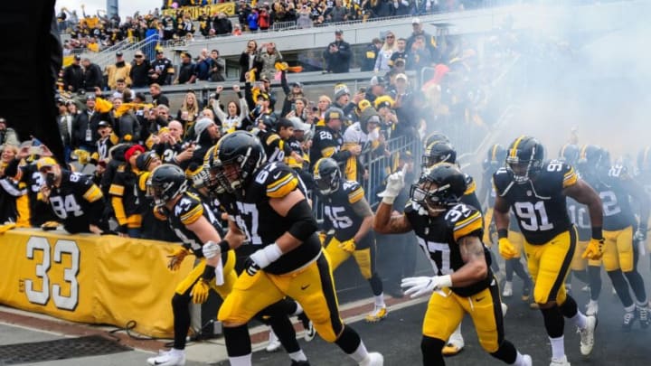 Oct 28, 2018; Pittsburgh, PA, USA; Pittsburgh Steelers offensive guard B.J. Finney (67) and defensive back Jordan Dangerfield (37) and defensive end Stephon Tuitt (91) enter the field before the game against the Cleveland Browns at Heinz Field. Mandatory Credit: Jeffrey Becker-USA TODAY Sports