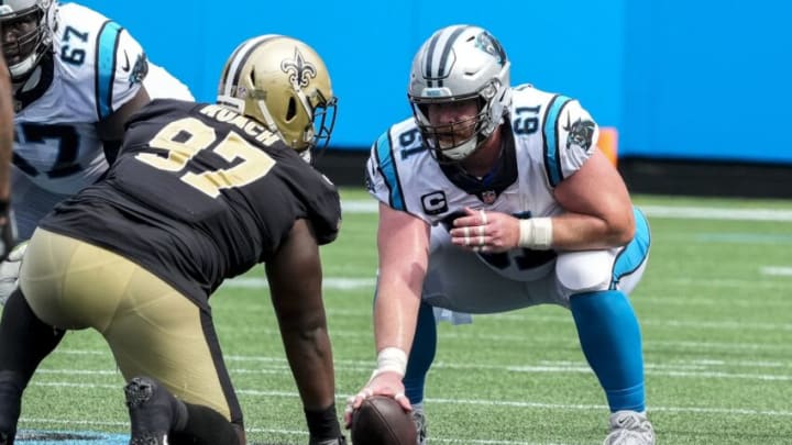 Sep 19, 2021; Charlotte, North Carolina, USA; New Orleans Saints defensive end Malcolm Roach (97) goes up against Carolina Panthers center Matt Paradis (61)during the second half at Bank of America Stadium. Mandatory Credit: Jim Dedmon-USA TODAY Sports