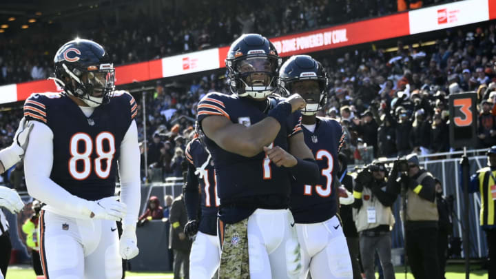 Nov 13, 2022; Chicago, Illinois, USA; Chicago Bears quarterback Justin Fields (1) celebrates with tight end Trevon Wesco (88) and wide receiver Byron Pringle (13) after he scores a touchdown against the Detroit Lions during the first half at Soldier Field. Mandatory Credit: Matt Marton-USA TODAY Sports