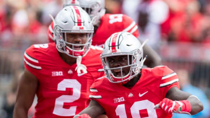 Sep 3, 2016; Columbus, OH, USA; Ohio State Buckeyes cornerbacks Eric Glover-Williams (19) and Marshon Lattimore (2) react after a tackle against the Bowling Green Falcons at Ohio Stadium. Mandatory Credit: Greg Bartram-USA TODAY Sports