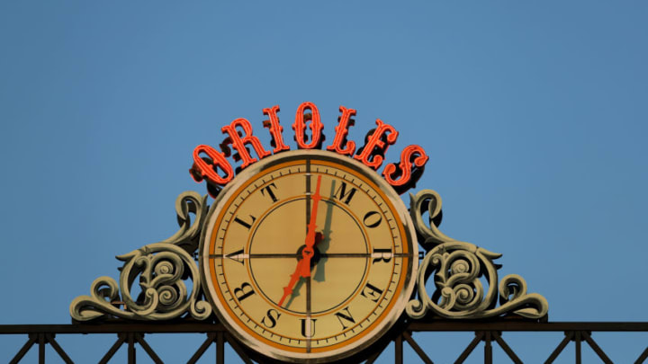 BALTIMORE, MARYLAND - APRIL 06: The clock above the scoreboard is shown during the Baltimore Orioles and New York Yankees game at Oriole Park at Camden Yards on April 06, 2019 in Baltimore, Maryland. (Photo by Rob Carr/Getty Images)