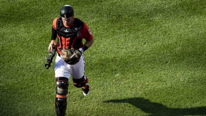 BALTIMORE, MD - JUNE 16: Austin Wynns #61 of the Baltimore Orioles in action during the eighth inning against the Miami Marlins at Oriole Park at Camden Yards on June 16, 2018 in Baltimore, Maryland. (Photo by Scott Taetsch/Getty Images)