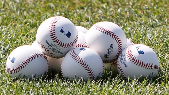 SARASOTA, FL - APRIL 03: Spring Training baseballs sit on the field prior to the start of the Grapefruit League Spring Training Game between the Baltimore Orioles and the New York Mets at Ed Smith Stadium on April 3, 2010 in Sarasota, Florida. (Photo by J. Meric/Getty Images)