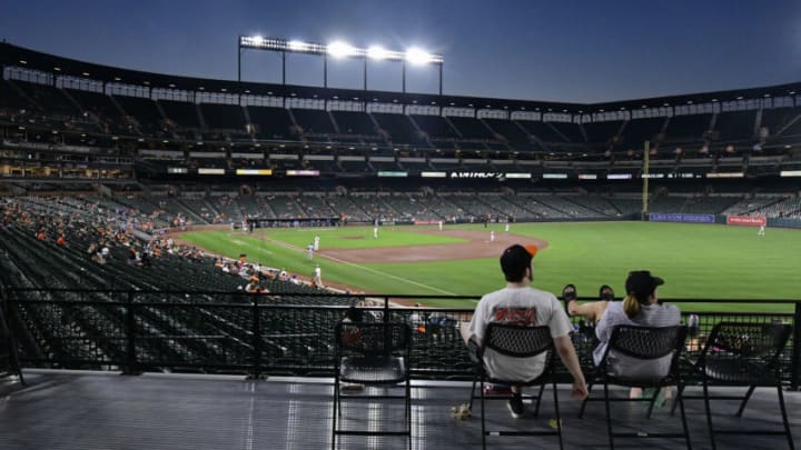 Sep 7, 2021; Baltimore, Maryland, USA; Spectators watch the game between the Baltimore Orioles and the Kansas City Royals from the right field over look at Oriole Park at Camden Yards. Mandatory Credit: Tommy Gilligan-USA TODAY Sports