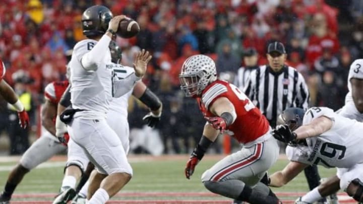 Nov 21, 2015; Columbus, OH, USA; Ohio State Buckeyes defensive lineman Joey Bosa (97) sacks Michigan State Spartans quarterback Damion Terry (6) in the first quarter at Ohio Stadium. Mandatory Credit: Geoff Burke-USA TODAY Sports Nov 21, 2015; Columbus, OH, USA; Ohio State Buckeyes defensive lineman Joey Bosa (97) sacks Michigan State Spartans quarterback Damion Terry (6) in the first quarter at Ohio Stadium. Mandatory Credit: Geoff Burke-USA TODAY Sports