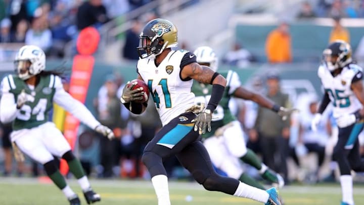 Nov 8, 2015; East Rutherford, NJ, USA; Jacksonville Jaguars cornerback Nick Marshall (41) runs the ball against the New York Jets during the third quarter at MetLife Stadium. Mandatory Credit: Brad Penner-USA TODAY Sports Nov 8, 2015; East Rutherford, NJ, USA; Jacksonville Jaguars cornerback Nick Marshall (41) runs the ball against the New York Jets during the third quarter at MetLife Stadium. Mandatory Credit: Brad Penner-USA TODAY Sports