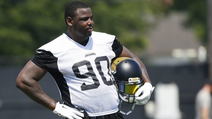 Jun 14, 2016; Jacksonville, FL, USA; Jacksonville Jaguars defensive lineman Malik Jackson (90) looks on during minicamp workouts at Florida Blue Health and Wellness Practice Fields. Mandatory Credit: Logan Bowles-USA TODAY Sports