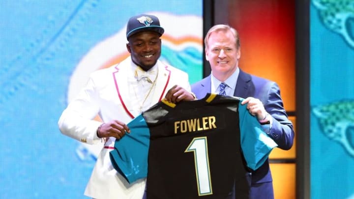 Apr 30, 2015; Chicago, IL, USA; Dante Fowler, Jr (Florida) greets NFL commissioner Roger Goodell is selected by the Jacksonville Jaguars as the number three overall pick in the first round of the 2015 NFL Draft at the Auditorium Theatre of Roosevelt University. Mandatory Credit: Jerry Lai-USA TODAY Sports