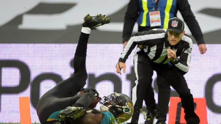 Oct 25, 2015; London, United Kingdom; Jacksonville Jaguars receiver Allen Hurns (88) catches a 31-yard touchdown pass with 2:16 to play for the winning points in a 34-31 victory against the Buffalo Bills as field judge Michael Banks (72) watches during NFL International Series game at Wembley Stadium. Mandatory Credit: Kirby Lee-USA TODAY Sports