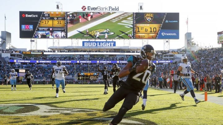 Dec 24, 2016; Jacksonville, FL, USA; Jacksonville Jaguars cornerback Jalen Ramsey (20) returns a interception for a touchdown in the second half against the Tennessee Titans at EverBank Field. The Jacksonville Jaguars won 38-17. Mandatory Credit: Logan Bowles-USA TODAY Sports