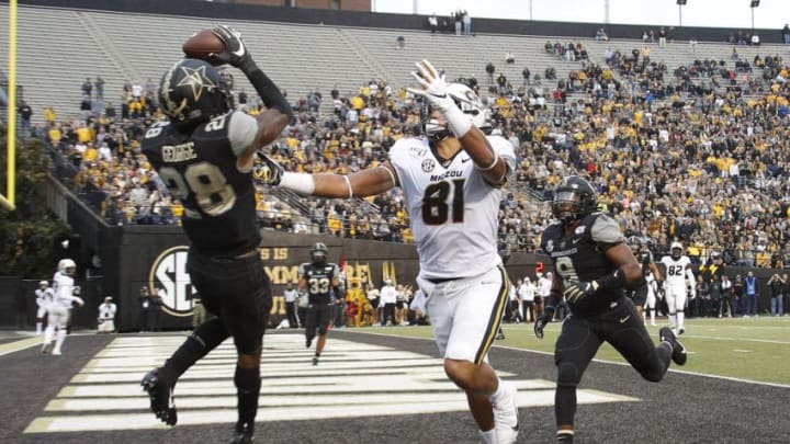 NASHVILLE, TENNESSEE - OCTOBER 19: Allan George #28 of the Vanderbilt Commodores makes an interception in the end zone over Albert Okwuegbunam #81 of the Missouri Tigers during the second half of a Vanderbilt 21-14 upset of the Missouri Tigers at Vanderbilt Stadium on October 19, 2019 in Nashville, Tennessee. (Photo by Frederick Breedon/Getty Images)