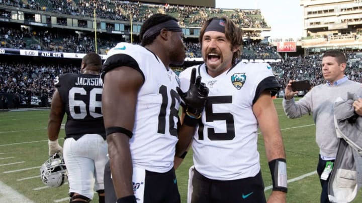 OAKLAND, CA - DECEMBER 15: Quarterback Gardner Minshew II #15 of the Jacksonville Jaguars and wide receiver Chris Conley #18 celebrate after the game against the Oakland Raiders at RingCentral Coliseum on December 15, 2019 in Oakland, California. The Jacksonville Jaguars defeated the Oakland Raiders 20-16. Photo by (Jason O. Watson/Getty Images)