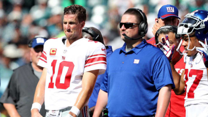 PHILADELPHIA, PA - SEPTEMBER 24: Eli Manning #10 of the New York Giants and head coach Ben McAdoo wait for the review on a touchdown scored in the second quarter by the New York Giants on September 24, 2017 at Lincoln Financial Field in Philadelphia, Pennsylvania.The touchdown was called back and the New York Giants did not score on the possession against the Philadelphia Eagles. (Photo by Elsa/Getty Images)