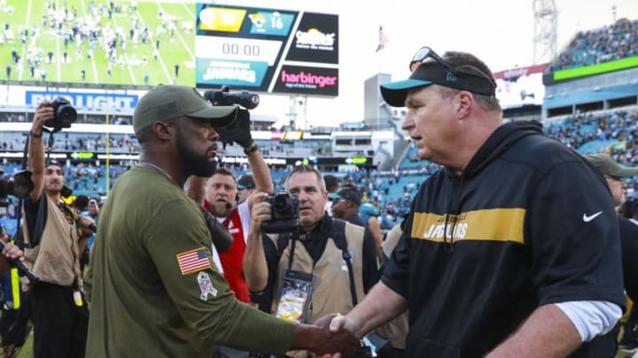 JACKSONVILLE, FL - NOVEMBER 18: Head coach Doug Marrone of the Jacksonville Jaguars (R) and head coach Mike Tomlin of the Pittsburgh Steelers shake hands following the Steelers 20-16 victory at TIAA Bank Field on November 18, 2018 in Jacksonville, Florida. (Photo by Scott Halleran/Getty Images)