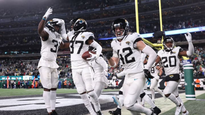 Tre Herndon #37 of the Jacksonville Jaguars celebrates with teammates after recovering a fumble during the 4th quarter of the game against the New York Jets at MetLife Stadium on December 22, 2022 in East Rutherford, New Jersey. (Photo by Dustin Satloff/Getty Images)