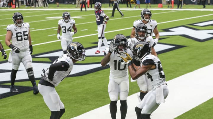 Oct 11, 2020; Houston, Texas, USA; Jacksonville Jaguars wide receiver Keelan Cole (84) celebrates with teammates after scoring a touchdown during the second quarter against the Houston Texans at NRG Stadium. Mandatory Credit: Troy Taormina-USA TODAY Sports