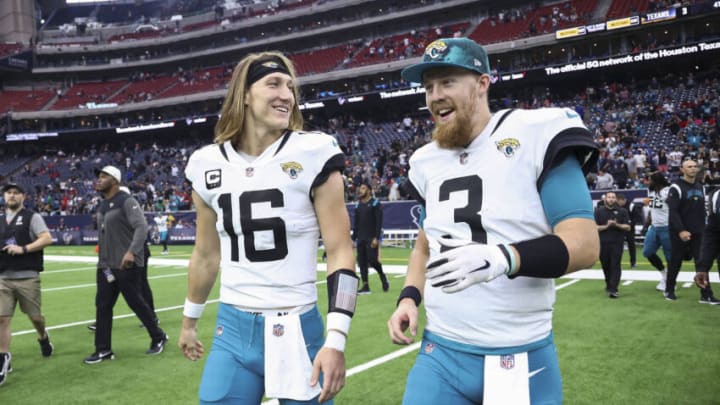 Jacksonville Jaguars quarterback Trevor Lawrence (16) and quarterback C.J. Beathard (3) at NRG Stadium. Mandatory Credit: Troy Taormina-USA TODAY Sports