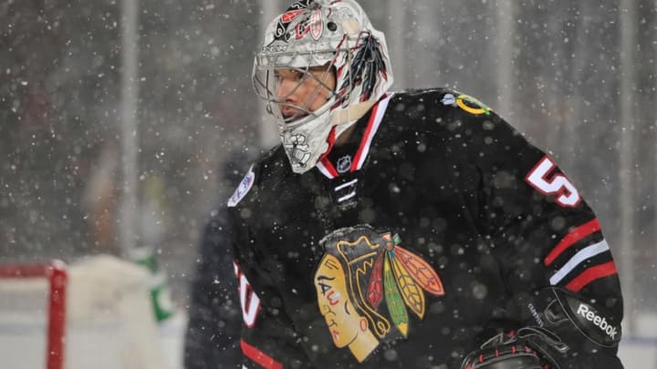 Mar 1, 2014; Chicago, IL, USA; Chicago Blackhawks goalie Corey Crawford skates during a break during the second period in a Stadium Series hockey game against the Pittsburgh Penguins at Soldier Field. Mandatory Credit: Rob Grabowski-USA TODAY Sports