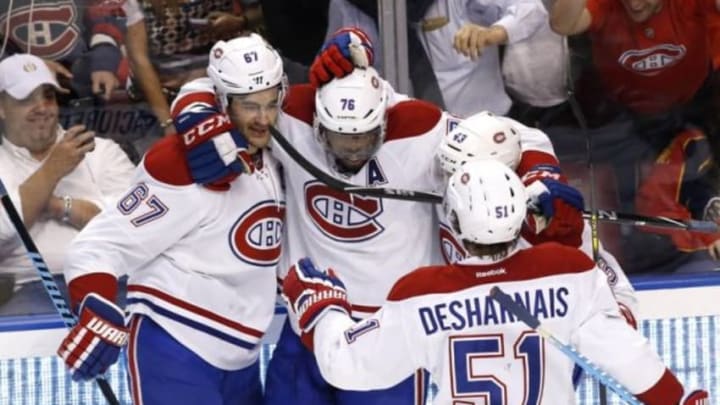 Dec 29, 2015; Sunrise, FL, USA; Montreal Canadiens left wing Max Pacioretty (67) celebrates his goal with defenseman P.K. Subban (76) , left wing Daniel Carr (43) and center David Desharnais (51) in the first period of a game against the Florida Panthers at BB&T Center. Mandatory Credit: Robert Mayer-USA TODAY Sports