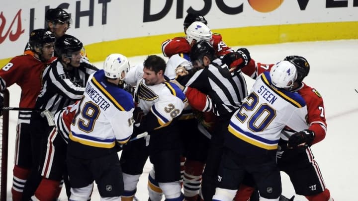 Apr 19, 2016; Chicago, IL, USA; The Chicago Blackhawks and St. Louis Blues scrap after game four of the first round of the 2016 Stanley Cup Playoffs at United Center. The Blues won 4-3. Mandatory Credit: David Banks-USA TODAY Sports