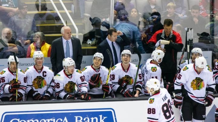 Nov 25, 2015; San Jose, CA, USA; Chicago Blackhawks head coach Joel Quenneville talks to his team during the game against the San Jose Sharks in the second period at SAP Center at San Jose. Mandatory Credit: John Hefti-USA TODAY Sports.