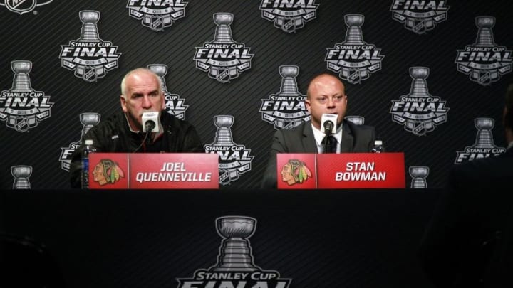 Jun 2, 2015; Tampa, FL, USA; Chicago Blackhawks head coach Joel Quenneville and general manager Stan Bowman talk with media during media day the day before the 2015 Stanley Cup Final at Amalie Arena. Mandatory Credit: Kim Klement-USA TODAY Sports
