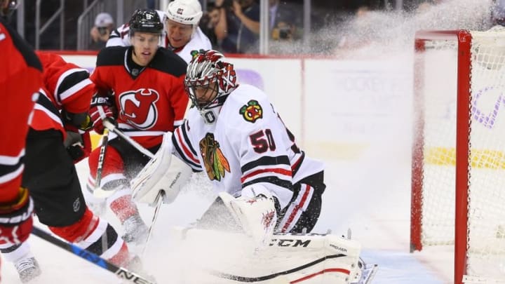 Oct 28, 2016; Newark, NJ, USA; Chicago Blackhawks goalie Corey Crawford (50) makes a save during the second period at Prudential Center. Mandatory Credit: Ed Mulholland-USA TODAY Sports Oct 28, 2016; Newark, NJ, USA; Chicago Blackhawks goalie Corey Crawford (50) makes a save during the second period at Prudential Center. Mandatory Credit: Ed Mulholland-USA TODAY Sports