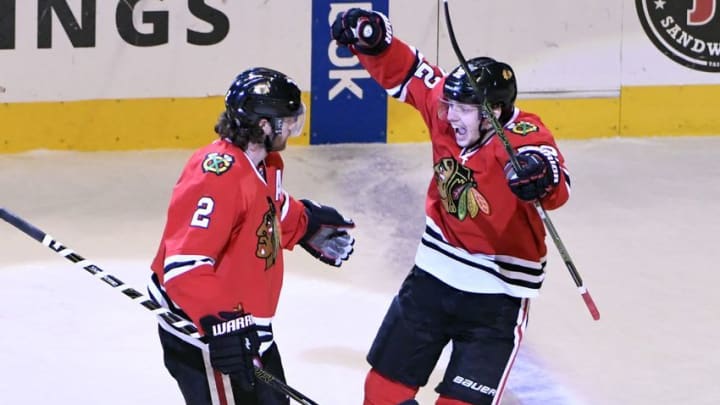 Dec 18, 2016; Chicago, IL, USA; Chicago Blackhawks defenseman Duncan Keith (2) celebrates his goal against the San Jose Sharks with left wing Artemi Panarin (72) during the second period at the United Center. Mandatory Credit: David Banks-USA TODAY Sports