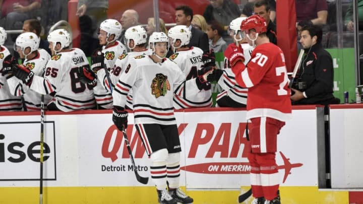 DETROIT, MI - SEPTEMBER 17: Chicago Blackhawks left wing Dominik Kubalik (8) celebrates his goal with teammates during the second period of a preseason game between the Chicago Blackhawks and the Detroit Red Wings on September 17, 2019, at Little Caesars Arena in Detroit, MI. (Photo by Roy K. Miller/Icon Sportswire via Getty Images)