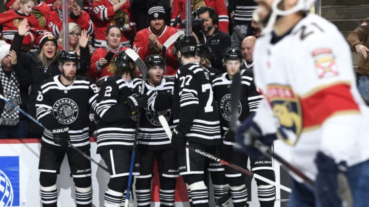 CHICAGO, IL - JANUARY 21: Patrick Kane #88 of the Chicago Blackhawks (middle) reacts after scoring against the Florida Panthers in the third period at the United Center on January 21, 2020 in Chicago, Illinois. (Photo by Bill Smith/NHLI via Getty Images)