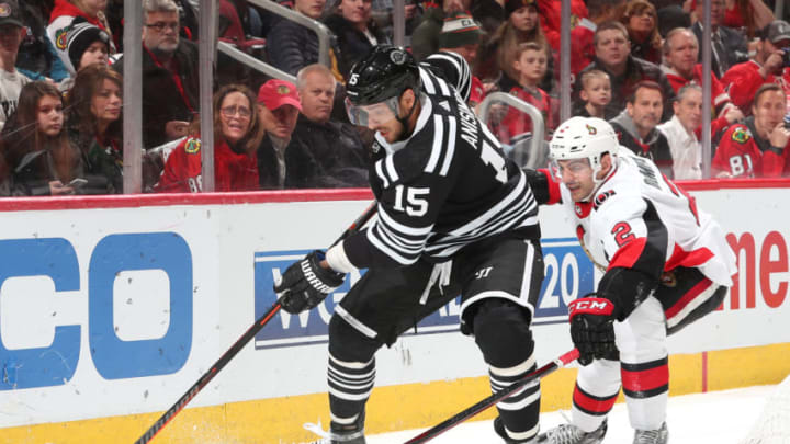 CHICAGO, IL - FEBRUARY 18: Artem Anisimov #15 of the Chicago Blackhawks and Dylan DeMelo #2 of the Ottawa Senators chase the puck in the second period at the United Center on February 18, 2019 in Chicago, Illinois. (Photo by Chase Agnello-Dean/NHLI via Getty Images) CHICAGO, IL - FEBRUARY 18: Artem Anisimov #15 of the Chicago Blackhawks and Dylan DeMelo #2 of the Ottawa Senators chase the puck in the second period at the United Center on February 18, 2019 in Chicago, Illinois. (Photo by Chase Agnello-Dean/NHLI via Getty Images)