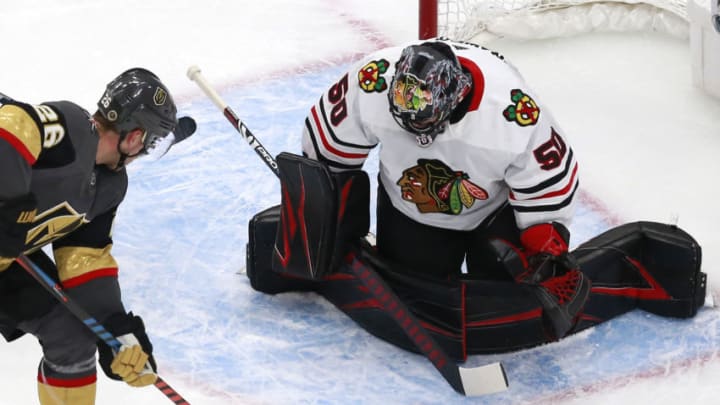 Corey Crawford #50, Chicago Blackhawks Photo by Jeff Vinnick/Getty Images)