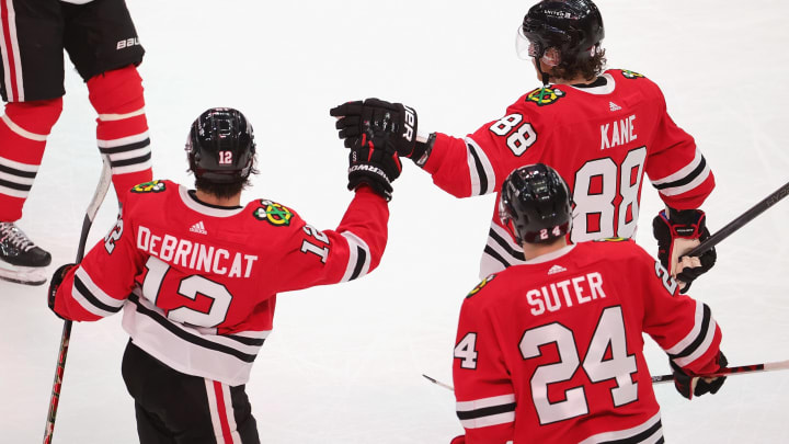 Chicago Blackhawks, Alex DeBrincat #12, Patrick Kane #88, Pius Suter #24