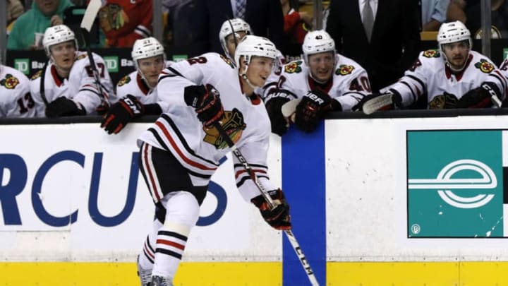 BOSTON, MA - SEPTEMBER 25: Chicago Blackhawks defenseman Gustav Forsling (42) shoots from the point during a preseason game between the Boston Bruins and the Chicago Blackhawks on September 25, 2017, at TD Garden in Boston, Massachusetts. (Photo by Fred Kfoury III/Icon Sportswire via Getty Images)