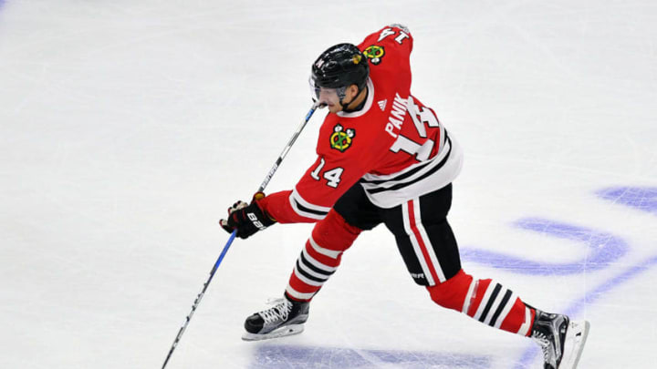 CHICAGO, IL - OCTOBER 19: Chicago Blackhawks right wing Richard Panik (14) takes a shot at goal during the match between the Edmonton Oilers and the Chicago Blackhawks on October 19, 2017 at the United Center in Chicago, Illinois. (Photo by Quinn Harris/Icon Sportswire via Getty Images)