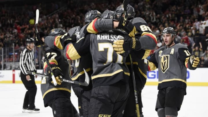 LAS VEGAS, NV - OCTOBER 24: The Vegas Golden Knights celebrate after scoring a goal against the Chicago Blackhawks during the game at T-Mobile Arena on October 24, 2017 in Las Vegas, Nevada. (Photo by Jeff Bottari/NHLI via Getty Images)