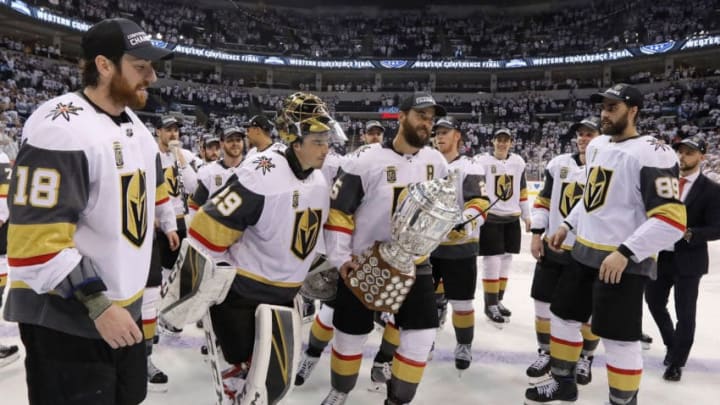 WINNIPEG, MB - MAY 20: Deryk Engelland #5 of the Vegas Golden Knights celebrates with the Clarence S. Campbell Bowl after defeating the Winnipeg Jets 2-1 in Game Five of the Western Conference Finals to advance to the 2018 NHL Stanley Cup Final at Bell MTS Place on May 20, 2018 in Winnipeg, Canada. (Photo by Jason Halstead/Getty Images)