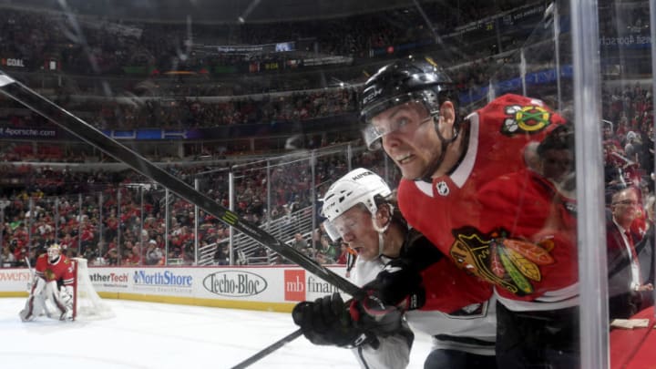 CHICAGO, IL - FEBRUARY 19: Tyler Toffoli #73 of the Los Angeles Kings and Carl Dahlstrom #63 of the Chicago Blackhawks get physical by the boards in the second period at the United Center on February 19, 2018 in Chicago, Illinois. (Photo by Bill Smith/NHLI via Getty Images)