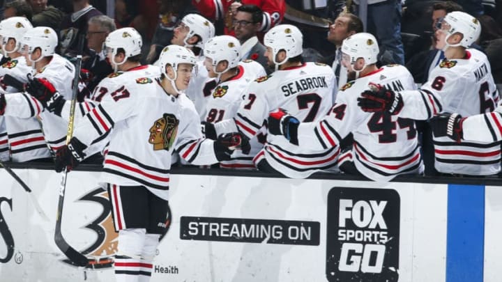 ANAHEIM, CA - NOVEMBER 3: Adam Boqvist #27 of the Chicago Blackhawks celebrates his first-period goal with the bench during the game against the Anaheim Ducks at Honda Center on November 3, 2019 in Anaheim, California. (Photo by Debora Robinson/NHLI via Getty Images)