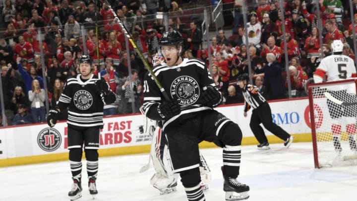 CHICAGO, IL - JANUARY 21: Drake Caggiula #91 of the Chicago Blackhawks reacts after scoring against the Florida Panthers in the third period at the United Center on January 21, 2020 in Chicago, Illinois. (Photo by Bill Smith/NHLI via Getty Images)