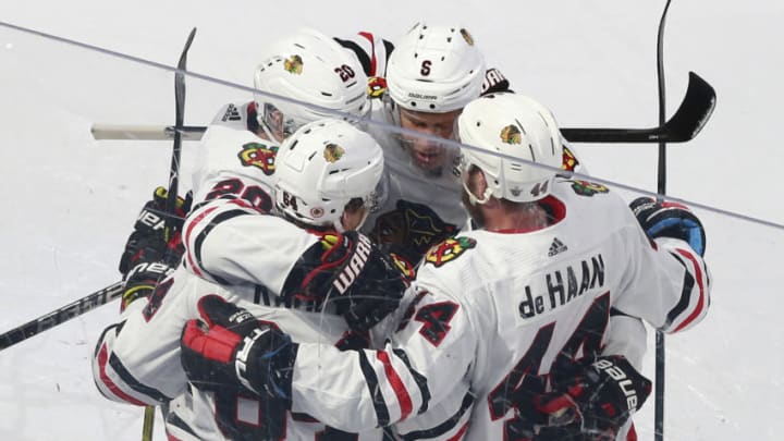 Chicago Blackhawks, Calvin de Haan, David Kampf (Photo by Jeff Vinnick/Getty Images)