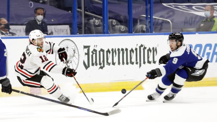 Alex DeBrincat #12, Tyler Johnson #9, Chicago Blackhawks Mandatory Credit: Kim Klement-USA TODAY Sports